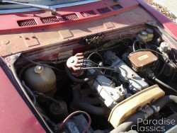 Red 1972 FIAT 124